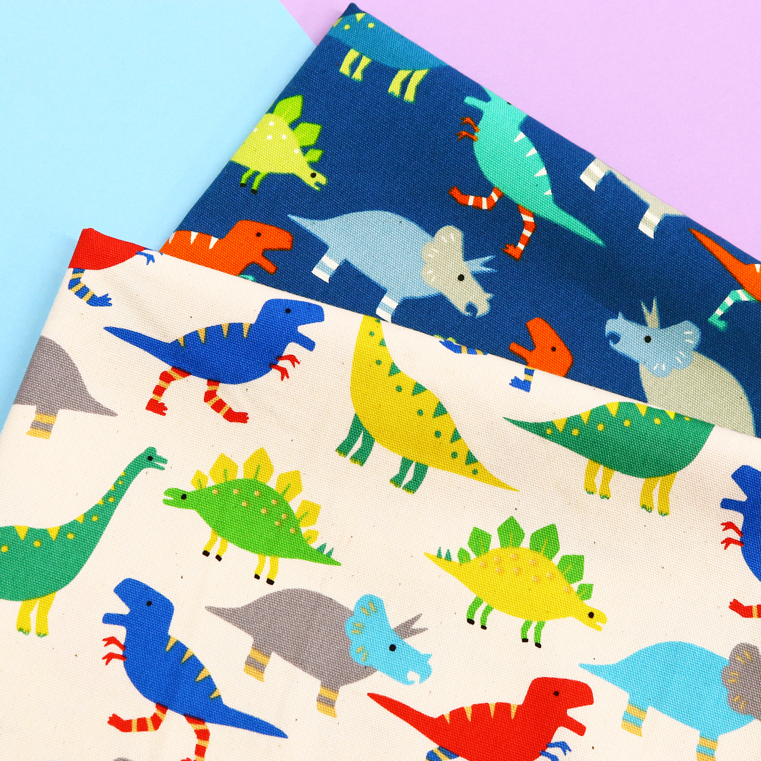 B850579-1 オックスプリント生地 ほっこり恐竜 巾約110cm 1m単位(m)